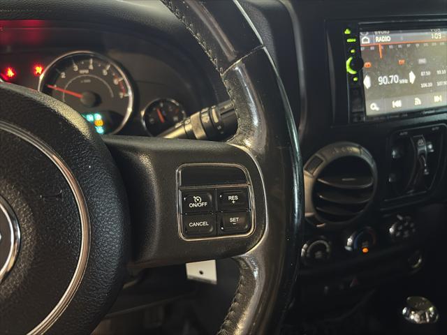 Photo of 2011 Black Clearcoat Jeep Wrangler Unlimited