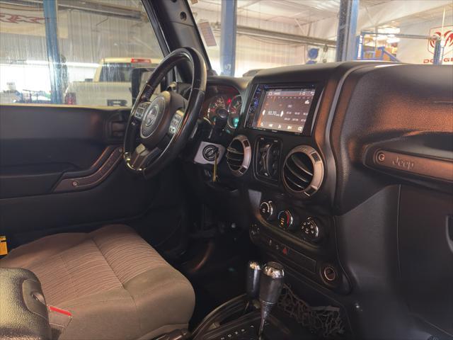 Photo of 2011 Black Clearcoat Jeep Wrangler Unlimited