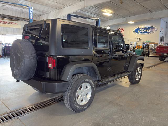 Photo of 2011 Black Clearcoat Jeep Wrangler Unlimited
