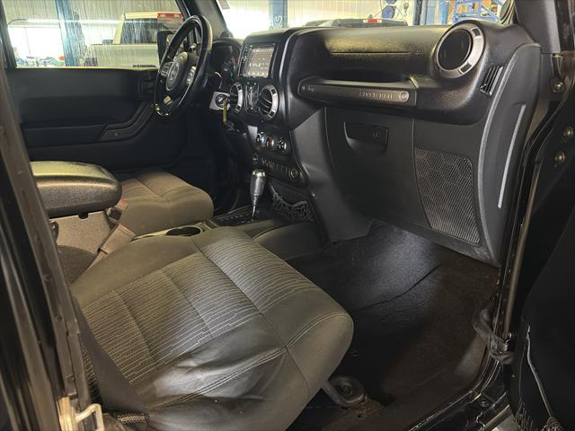 Photo of 2011 Black Clearcoat Jeep Wrangler Unlimited
