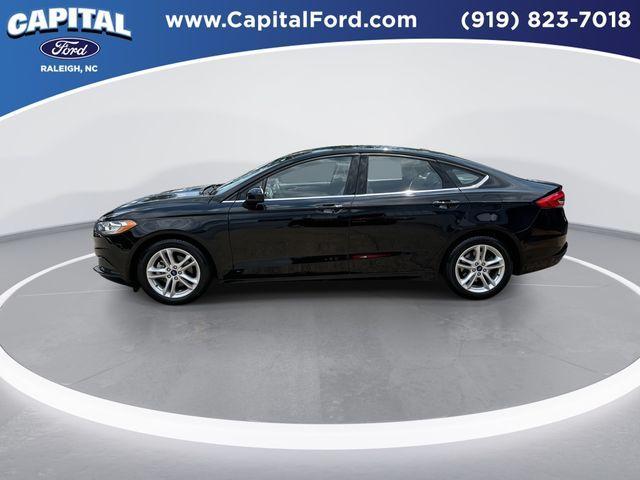 Photo of 2018 Shadow Black Ford Fusion Hybrid