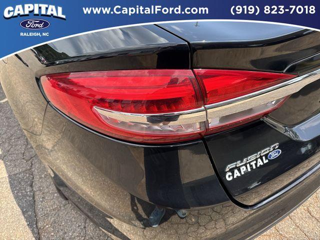 Photo of 2018 Shadow Black Ford Fusion Hybrid