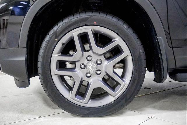 Photo of 2023 Crystal Black Pearl Honda Passport