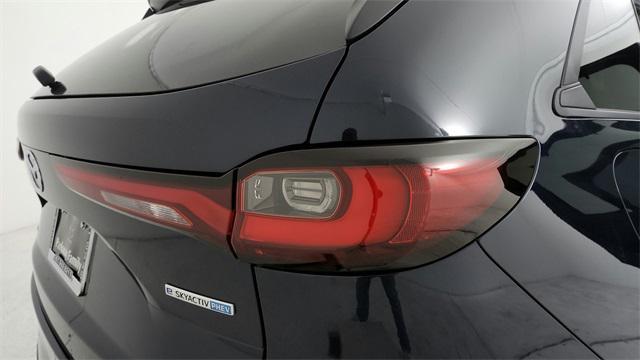 Photo of 2025 Deep Crystal Blue Mica Mazda CX-90 PHEV