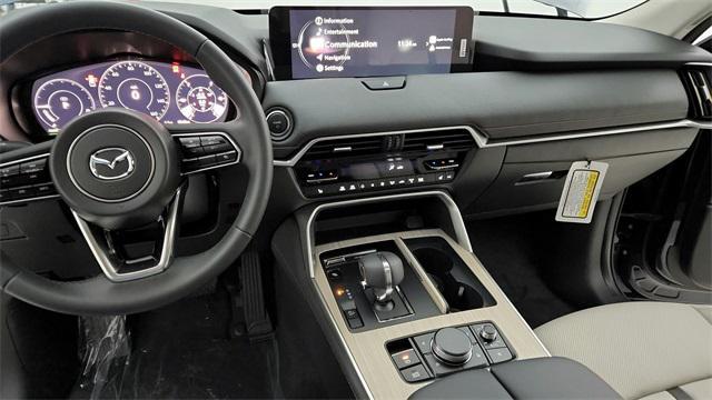 Photo of 2025 Deep Crystal Blue Mica Mazda CX-90 PHEV