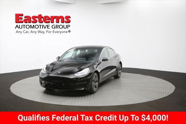 Photo of 2019 Solid Black Tesla Model 3