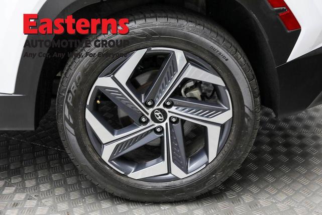 Photo of 2022 Quartz White Hyundai TUCSON Hybrid