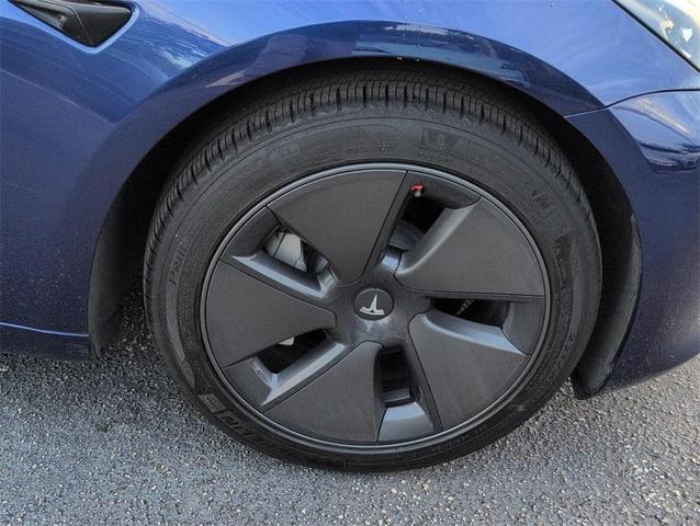 Photo of 2023 Deep Blue Metallic Tesla Model 3