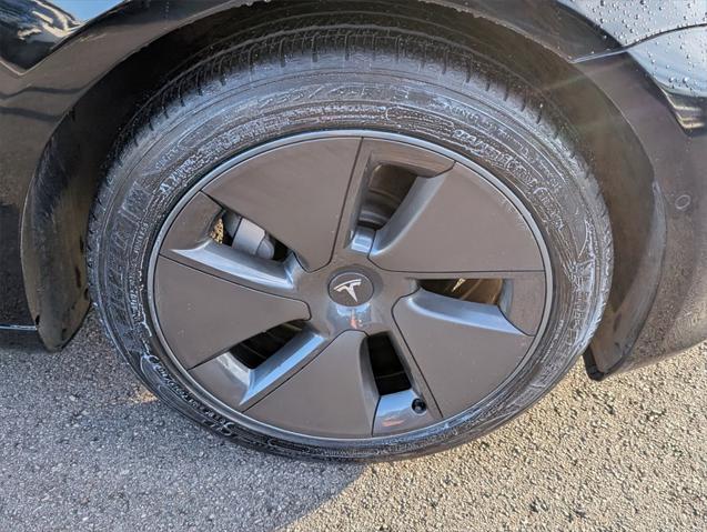 Photo of 2021 Solid Black Tesla Model 3
