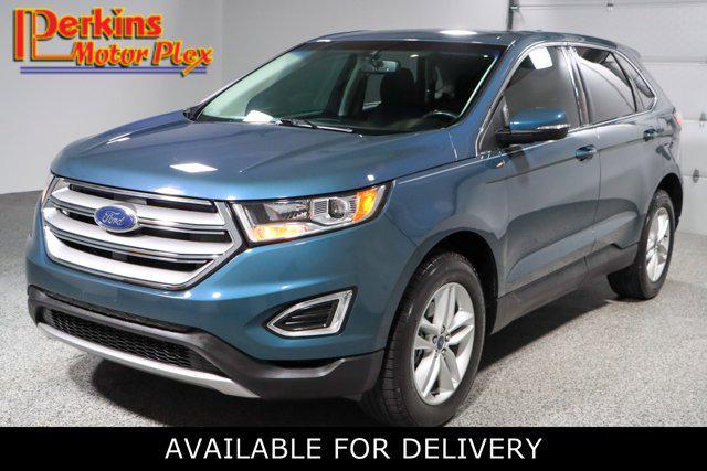 Photo of 2016 Blue Ford Edge