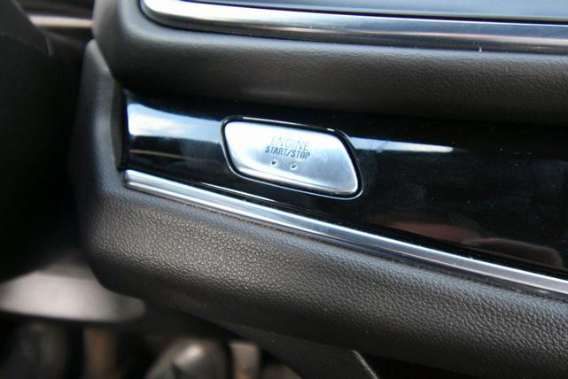 Photo of 2023 Sage Metallic Buick Enclave
