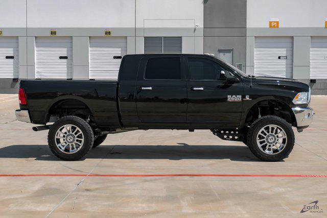 Photo of 2017 Brilliant Black Crystal Pearlcoat RAM 2500
