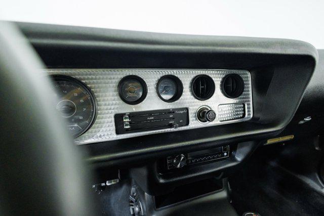 Photo of 1977 Yellow Pontiac Firebird