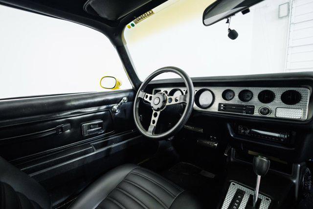Photo of 1977 Yellow Pontiac Firebird