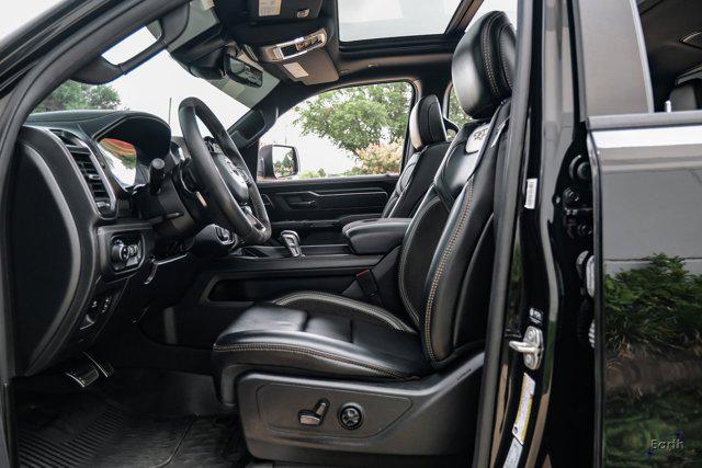 Photo of 2024 Diamond Black Crystal Pearlcoat RAM 1500
