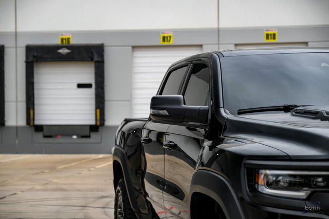 Photo of 2024 Diamond Black Crystal Pearlcoat RAM 1500