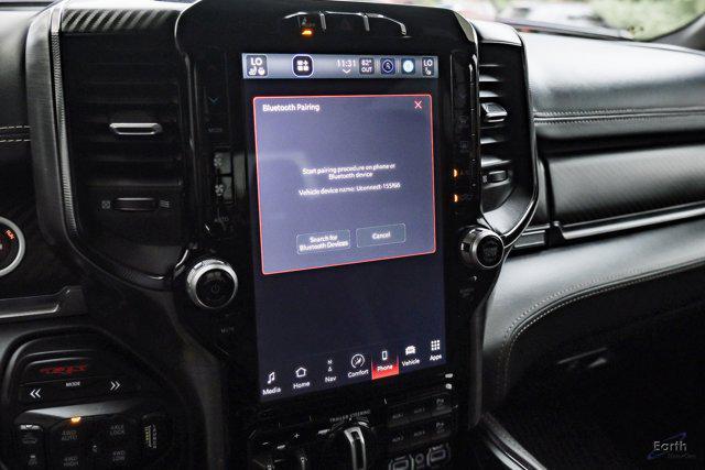 Photo of 2024 Diamond Black Crystal Pearlcoat RAM 1500