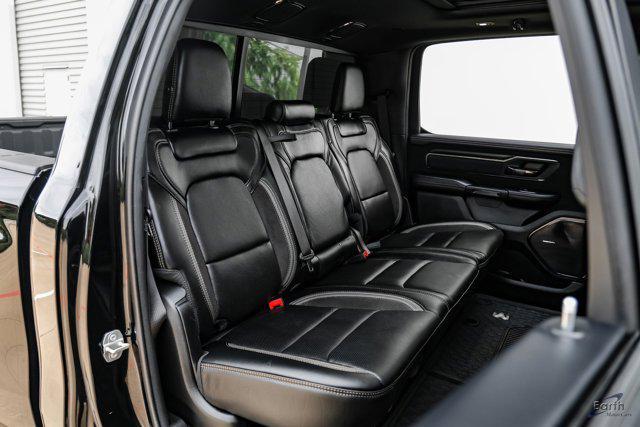 Photo of 2024 Diamond Black Crystal Pearlcoat RAM 1500
