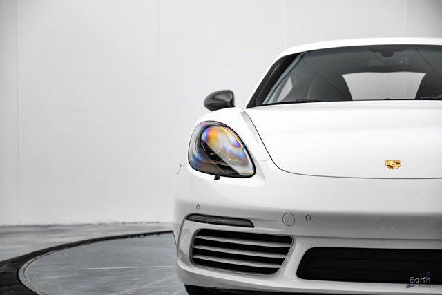 Photo of 2023 Black Porsche 718 Cayman