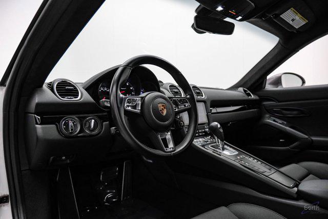 Photo of 2023 Black Porsche 718 Cayman