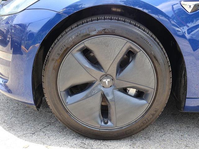 Photo of 2020 Deep Blue Metallic Tesla Model 3
