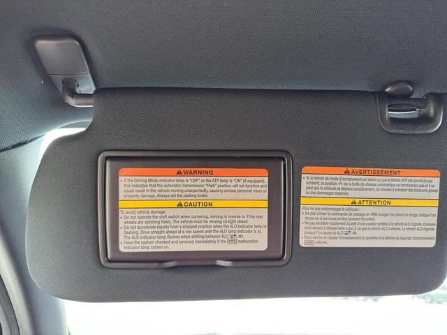 Photo of 2023 Tactical Green Nissan Frontier