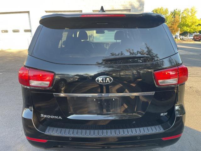 Photo of 2018 Aurora Black Kia Sedona