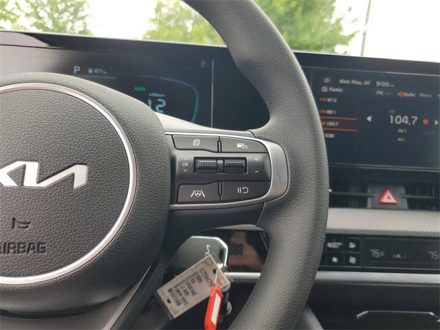 Photo of 2025 Snow White Pearl Kia Sportage Hybrid