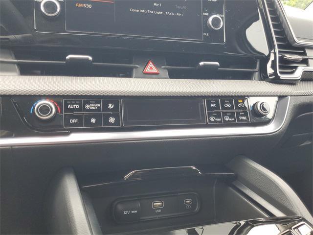 Photo of 2025 Snow White Pearl Kia Sportage Hybrid