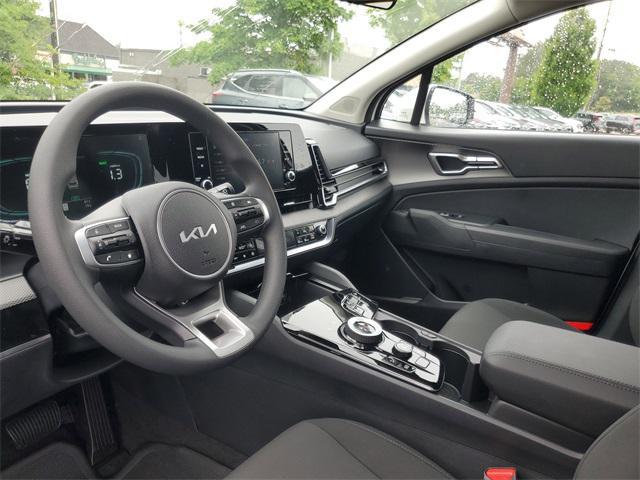 Photo of 2025 Snow White Pearl Kia Sportage Hybrid