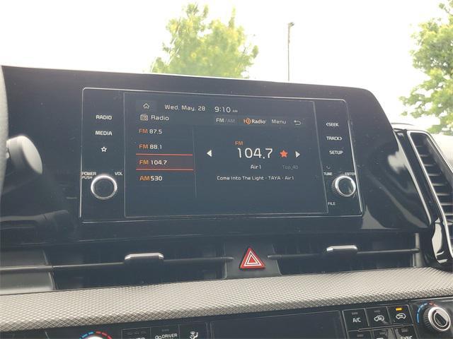 Photo of 2025 Snow White Pearl Kia Sportage Hybrid