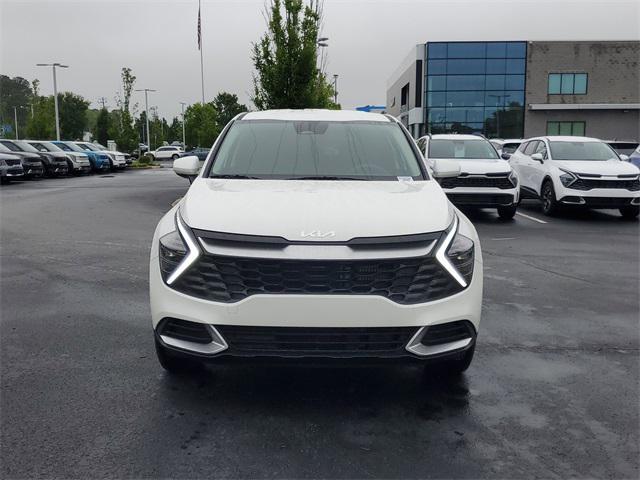 Photo of 2025 Snow White Pearl Kia Sportage Hybrid