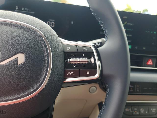 Photo of 2026 Snow White Pearl Kia Carnival Hybrid