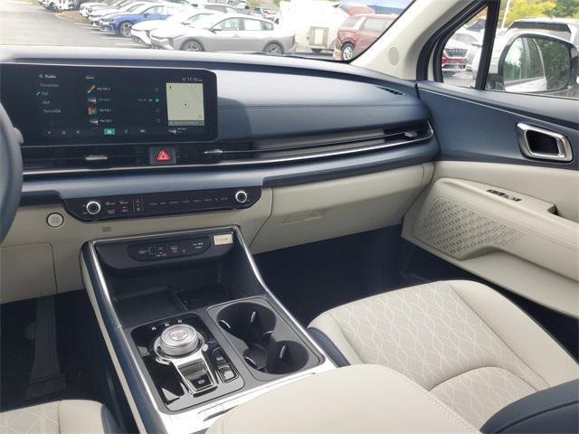 Photo of 2026 Snow White Pearl Kia Carnival Hybrid