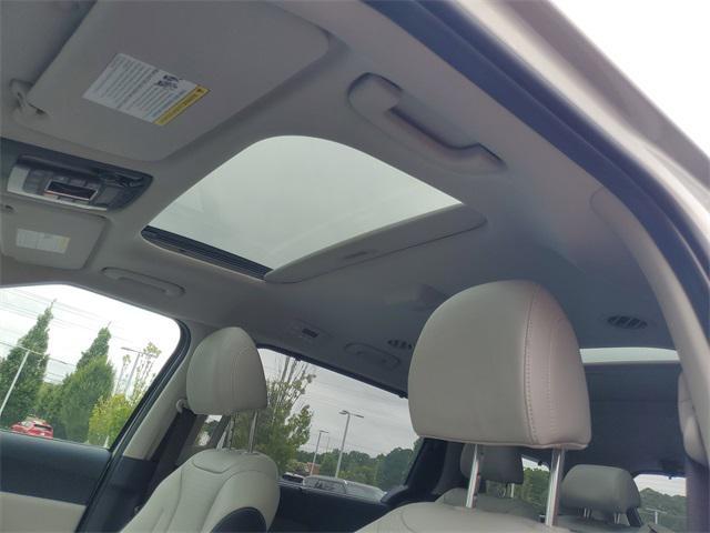 Photo of 2026 Ivory Silver Kia Carnival Hybrid