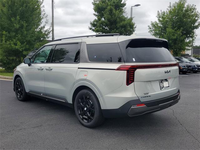 Photo of 2026 Ivory Silver Kia Carnival Hybrid