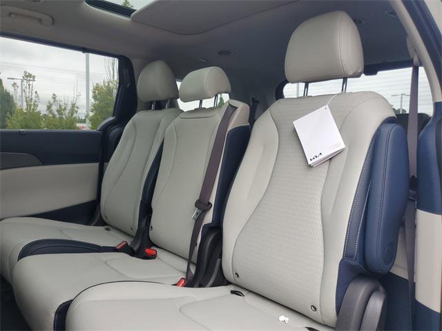 Photo of 2026 Ivory Silver Kia Carnival Hybrid