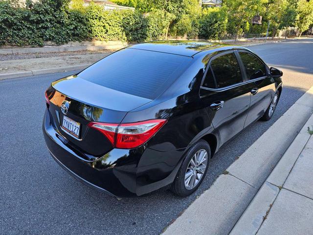 Photo of 2015 Black Sand Mica Toyota Corolla