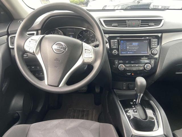 Photo of 2016 Midnight Jade Nissan Rogue