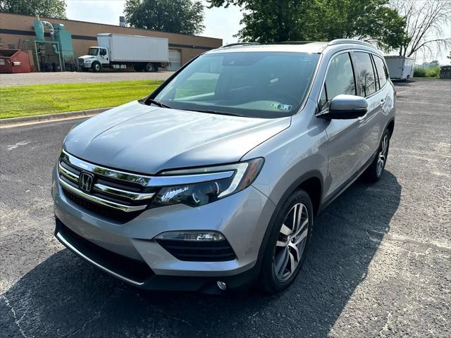 Photo of 2016 Lunar Silver Metallic Honda Pilot