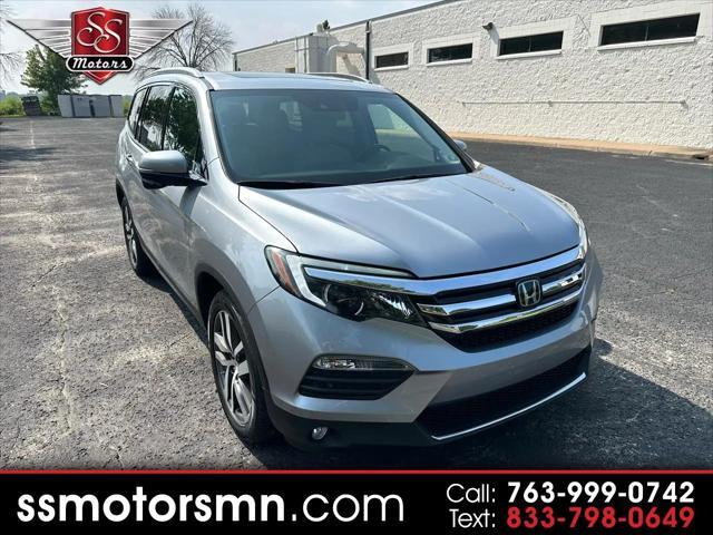 Photo of 2016 Lunar Silver Metallic Honda Pilot