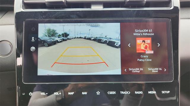 Photo of 2024 White Pearl Hyundai TUCSON Hybrid