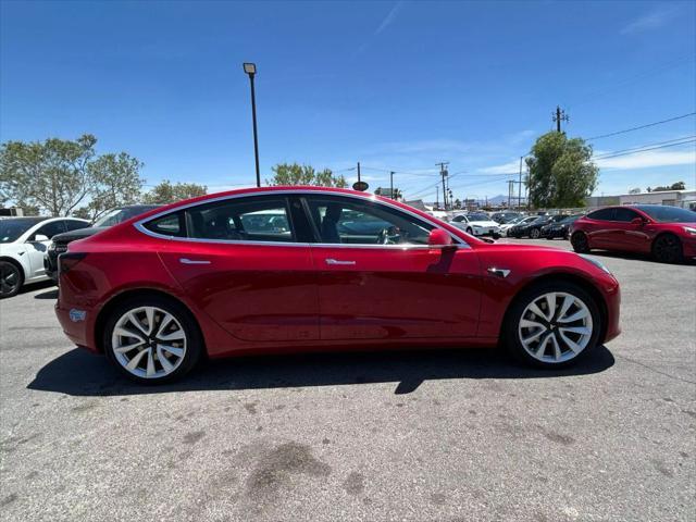 Photo of 2018 Red Tesla Model 3