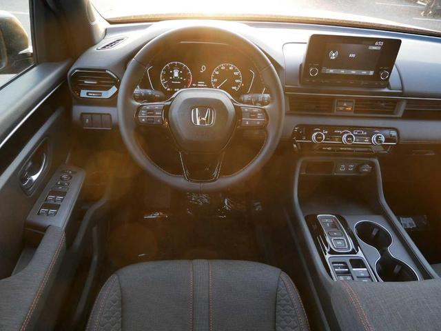 Photo of 2025 Radiant Red Metallic II Honda Pilot