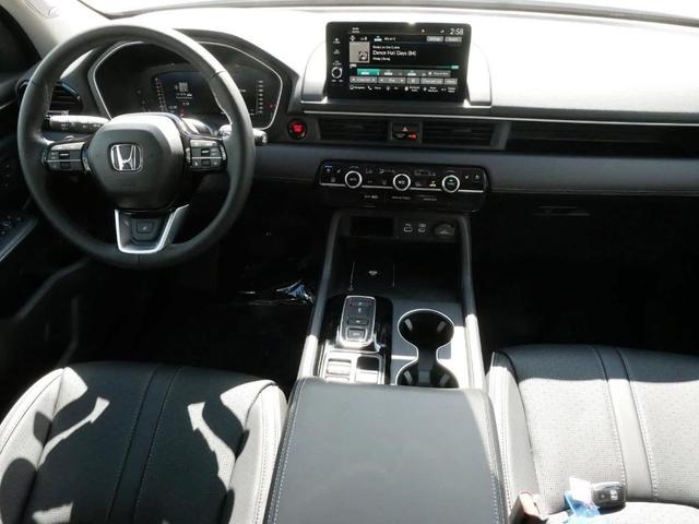 Photo of 2025 Radiant Red Metallic II Honda Pilot