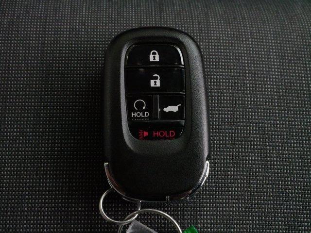 Photo of 2025 Radiant Red Metallic II Honda Pilot