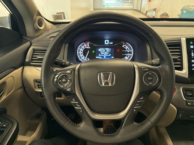 Photo of 2016 White Diamond Pearl Honda Pilot