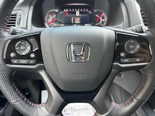 Photo of 2024 Radiant Red Metallic Honda Passport