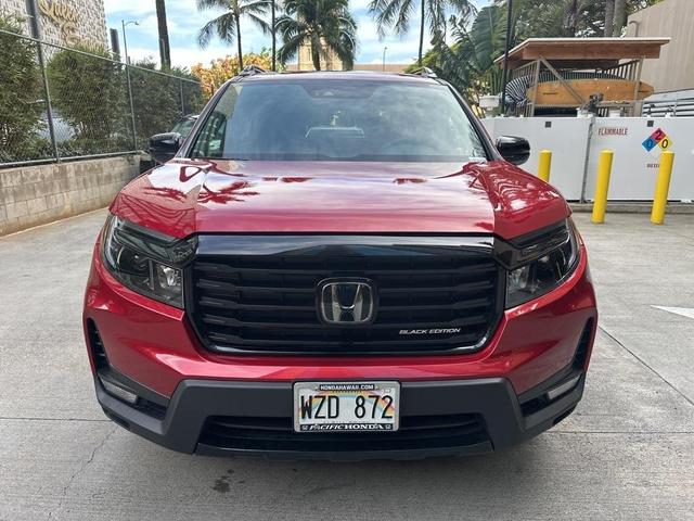 Photo of 2024 Radiant Red Metallic Honda Passport