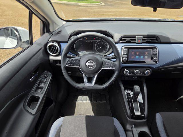 Photo of 2025 Aspen White Pearl Nissan Versa